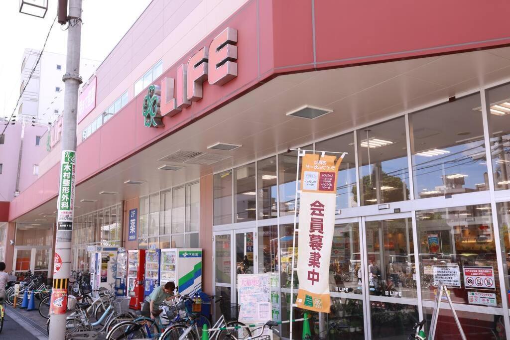 Sanacion Motomachi 7 なんばで150平米の広々空間 最大14名 Netflix見れます Lägenhet Osaka Exteriör bild