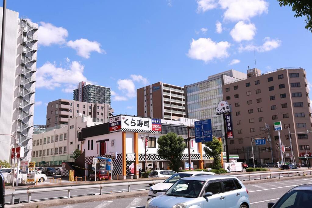 Sanacion Motomachi 7 なんばで150平米の広々空間 最大14名 Netflix見れます Lägenhet Osaka Exteriör bild